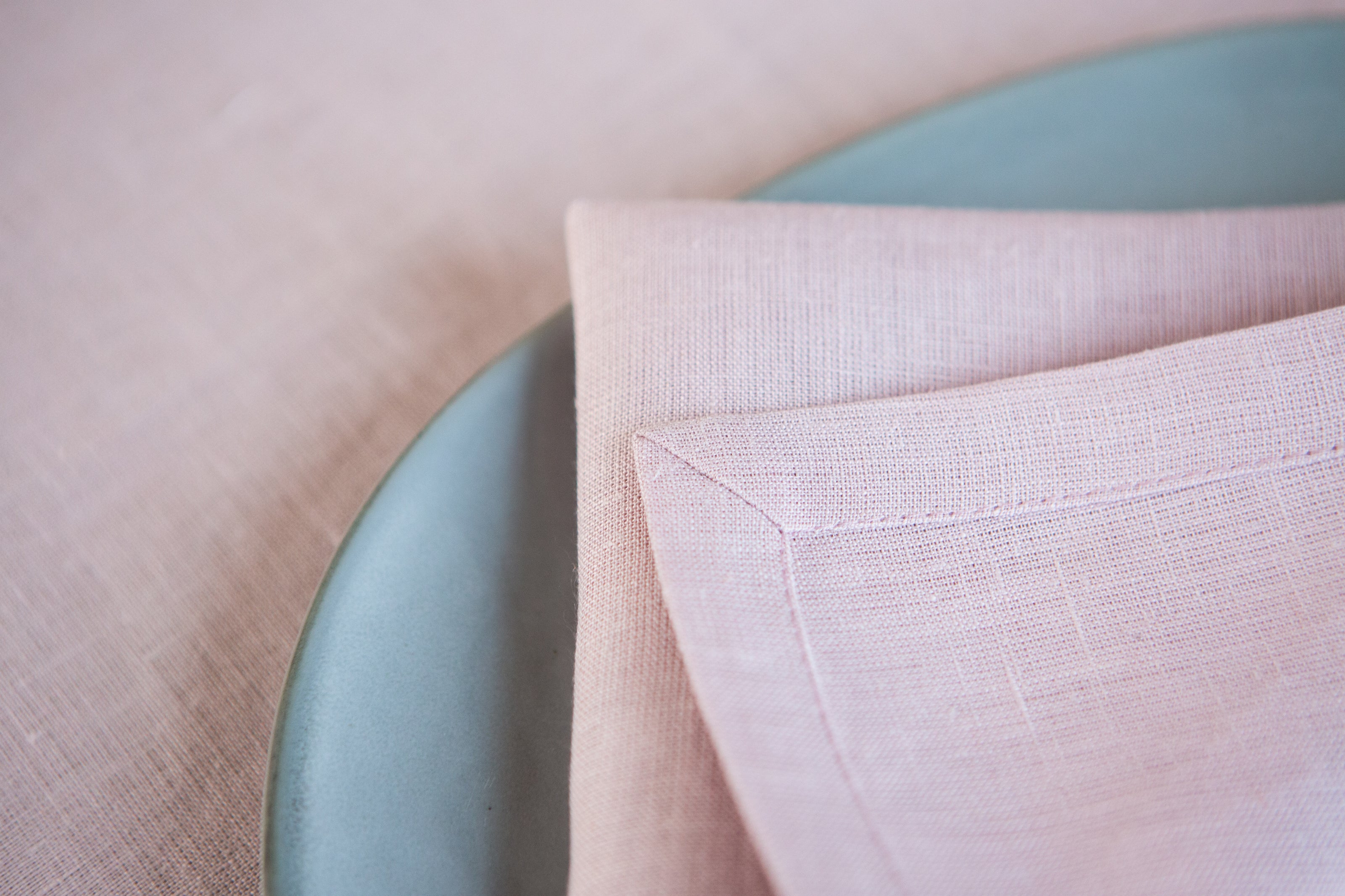 Pink opal organic linen napkins: OEKO-TEX certified, zero-waste, and perfect for creating a cozy, natural dining experience.