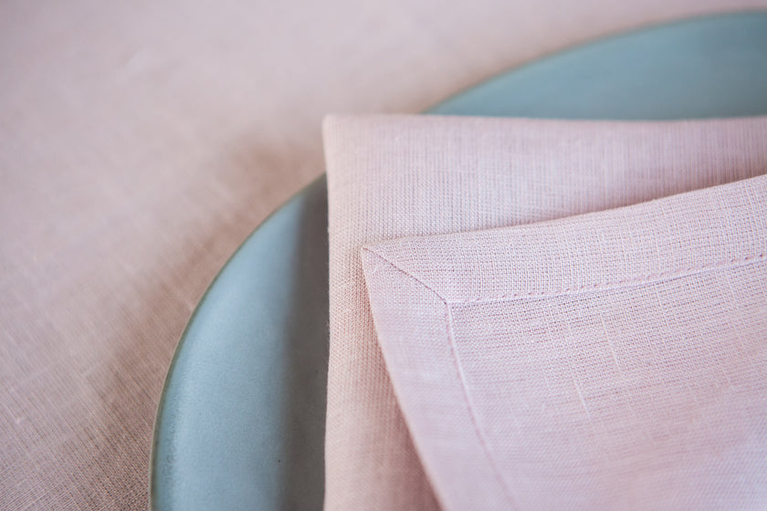 Pink opal organic linen napkins: OEKO-TEX certified, zero-waste, and perfect for creating a cozy, natural dining experience.