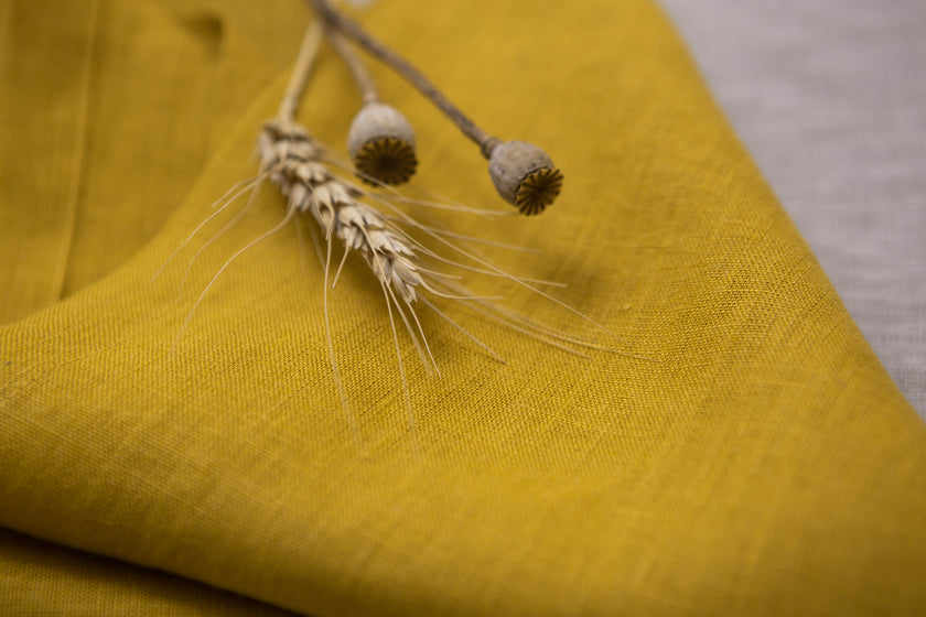Eco-friendly mustard linen napkins – ideal for holiday dinners or as a thoughtful gift for loved ones, combining elegance with sustainability.