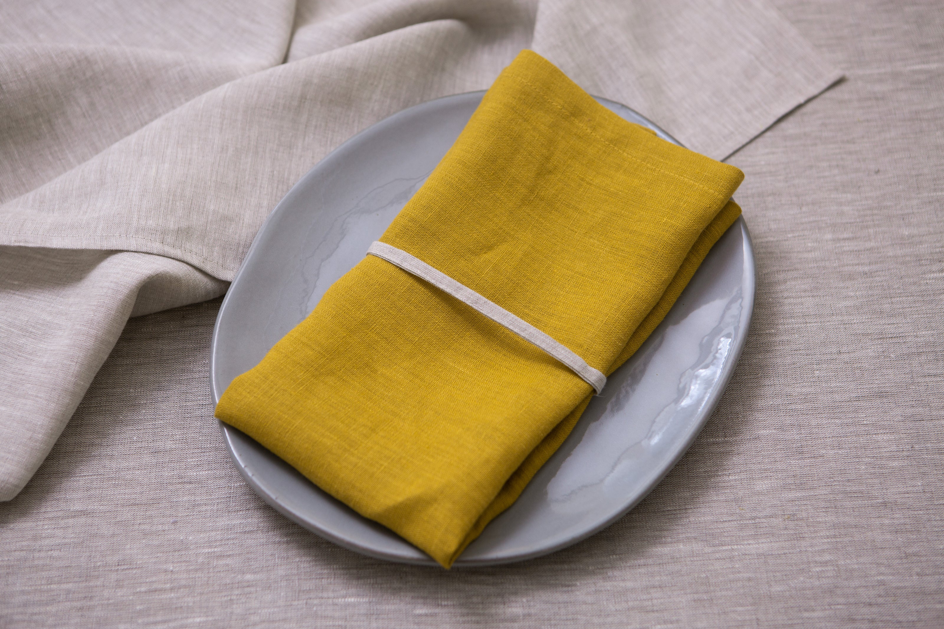 Mustard linen napkins made from 100% organic fabric. A colorful, eco-friendly choice for your home table decor.