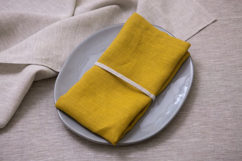 Mustard linen napkins made from 100% organic fabric. A colorful, eco-friendly choice for your home table decor.