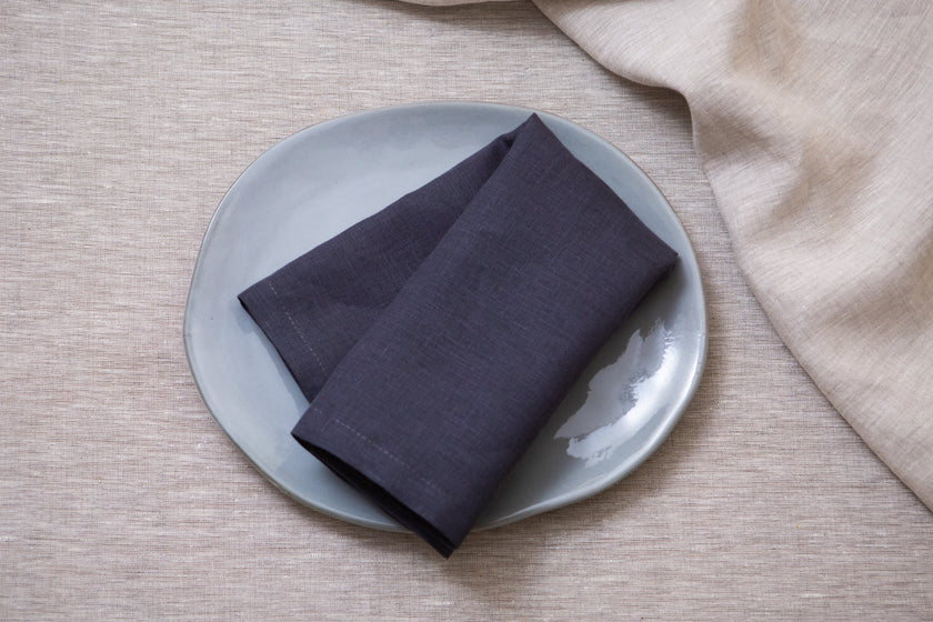 Sustainable slate linen napkins: eco-friendly, washable, and perfect for any meal or event. Wholesale custom orders.