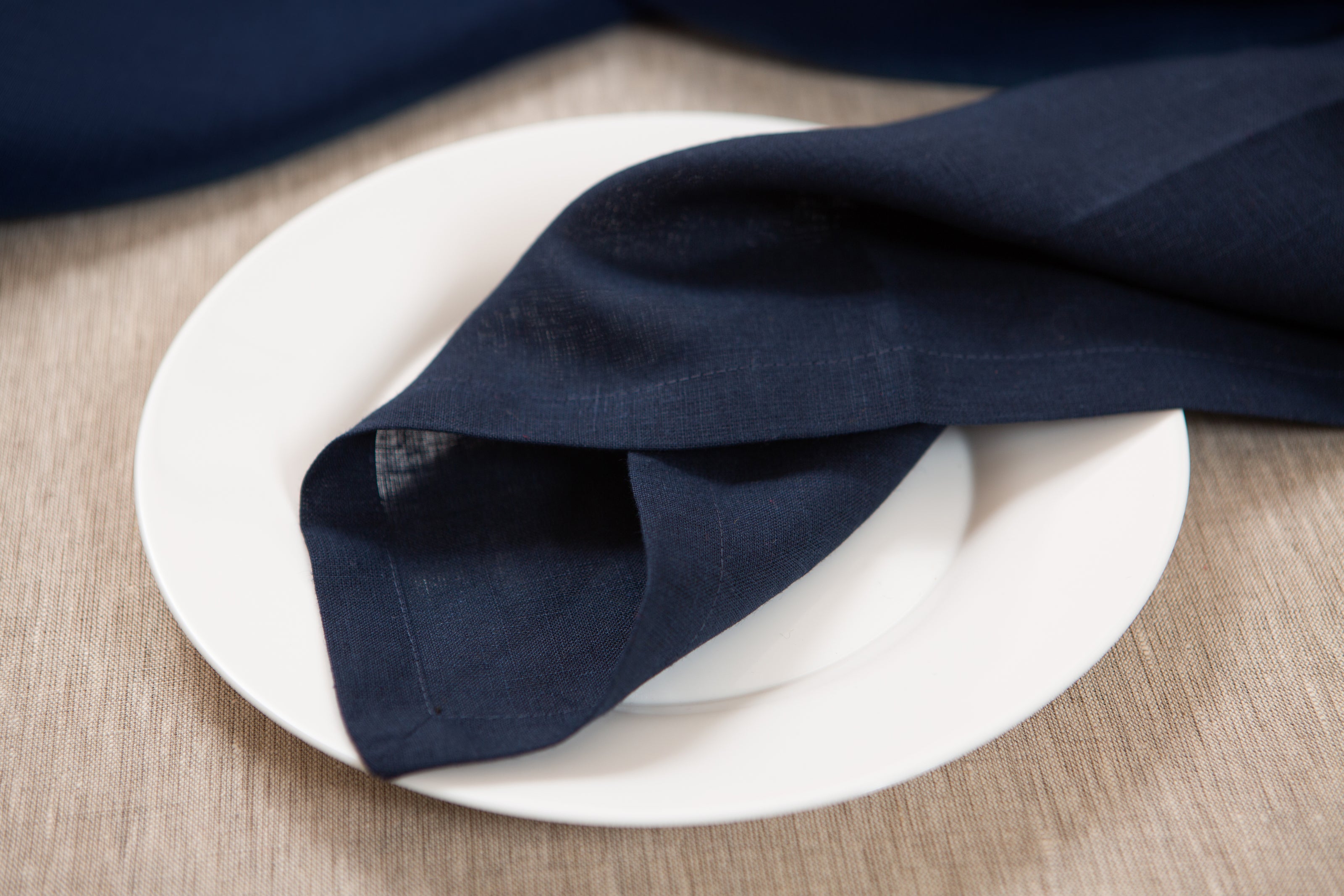 Classic old navy linen napkins crafted from eco-friendly organic fabric. A stylish and sustainable touch for every table setting. Perfect linen decor.