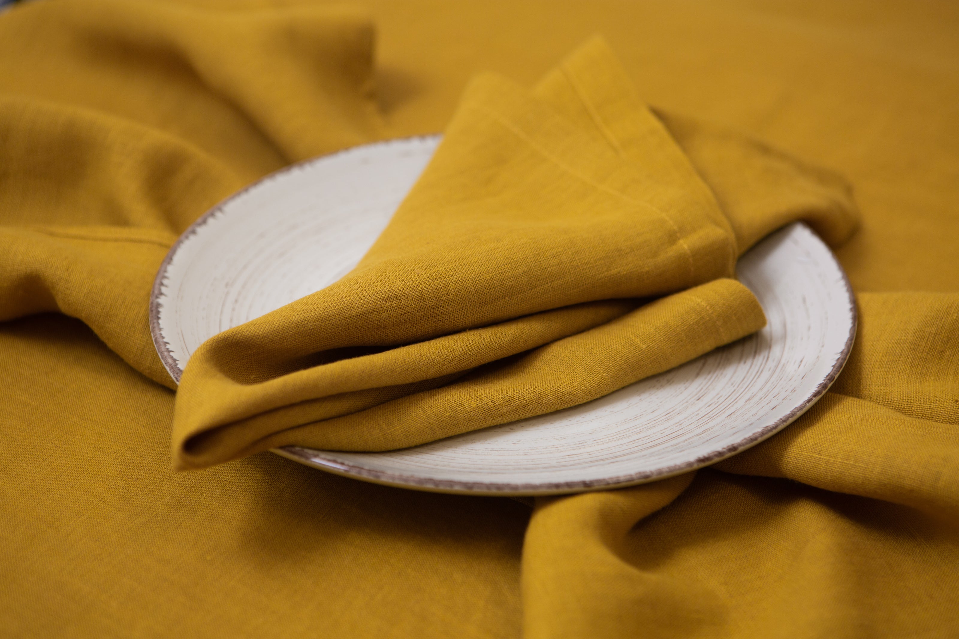 Mustard linen napkins made from 100% organic fabric – a vibrant, environmentally friendly choice for every special occasion or casual meal.