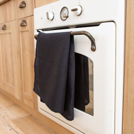Elegant black linen towel – a perfect gift for Christmas, housewarming, or Halloween, combining functionality with refined design.