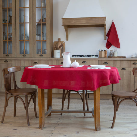 Classic red organic linen tablecloth, perfect for elegant dining, made from 100% eco-friendly linen, showcasing a timeless design for any occasion.