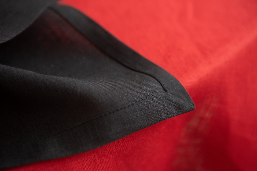 Perfect linen gift: stylish black linen napkins with mitered corners. Sustainable, zero-waste, and great for every meal and holidays.