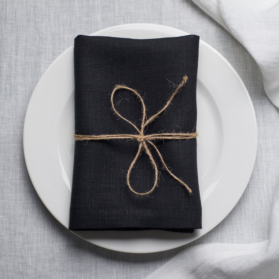 Black organic linen napkin with mitered corners – moody Halloween and holiday table decor