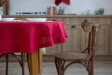 Classic red organic linen tablecloth, perfect for elegant dining, made from 100% eco-friendly linen, showcasing a timeless design for any occasion.