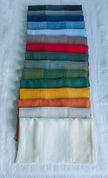 Colorful shade linen placemats made from natural flax, zero-waste table linens for eco-friendly table styling.