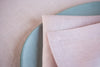 Pink opal organic linen napkins: OEKO-TEX certified, zero-waste, and perfect for creating a cozy, natural dining experience. 