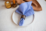 Classic cornflower blue linen napkins crafted from eco-friendly organic fabric. A sustainable touch for every table setting. Holiday linen home decor.