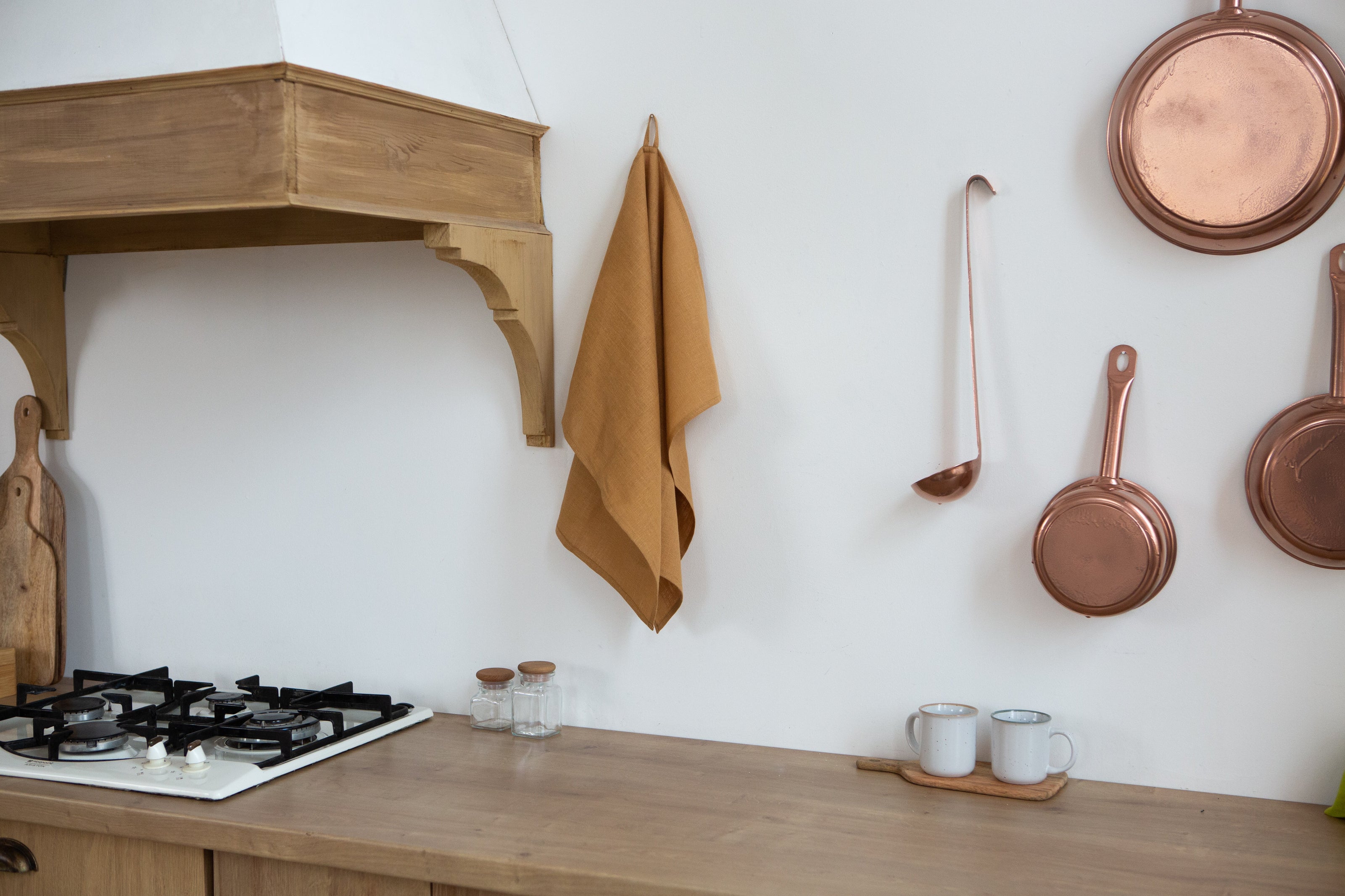 Honey linen kitchen towel in a rustic kitchen – warm harvest color