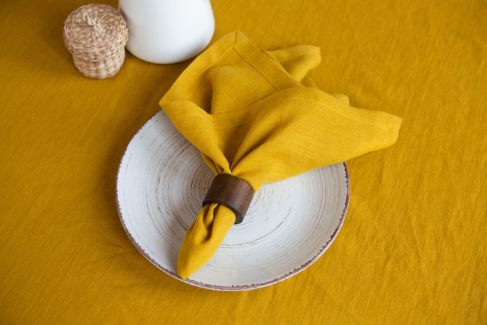 Mustard organic linen napkins – vibrant, eco-friendly, and durable. A perfect addition to any table setting for a bold, sustainable look.