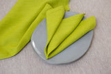 Organic lime green napkins crafted from 100% natural linen. Durable, biodegradable, and OEKO-TEX certified for a truly eco-conscious dining experience.