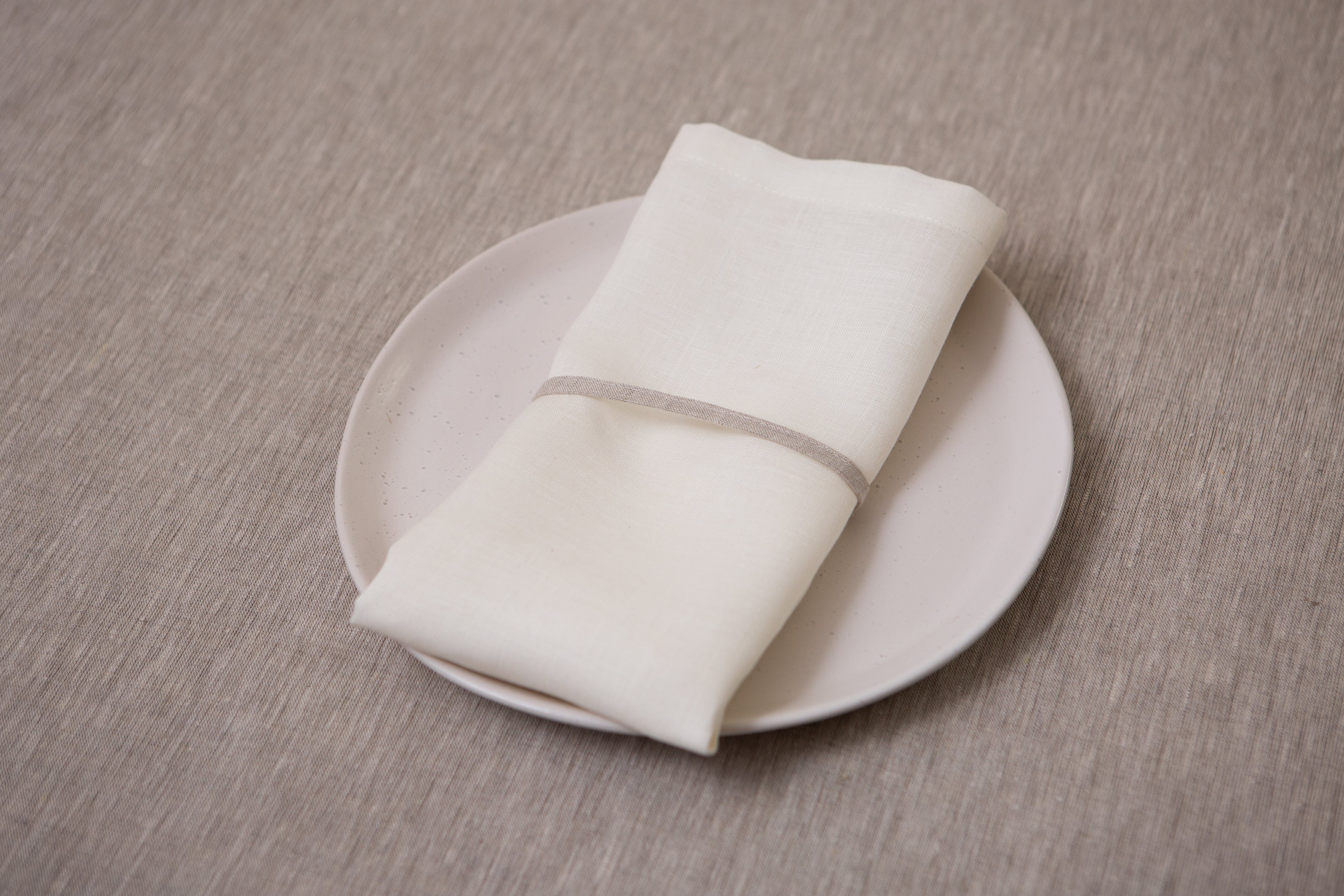 Versatile white organic linen napkins: OEKO-TEX certified, durable, and a perfect blend of style and sustainability.