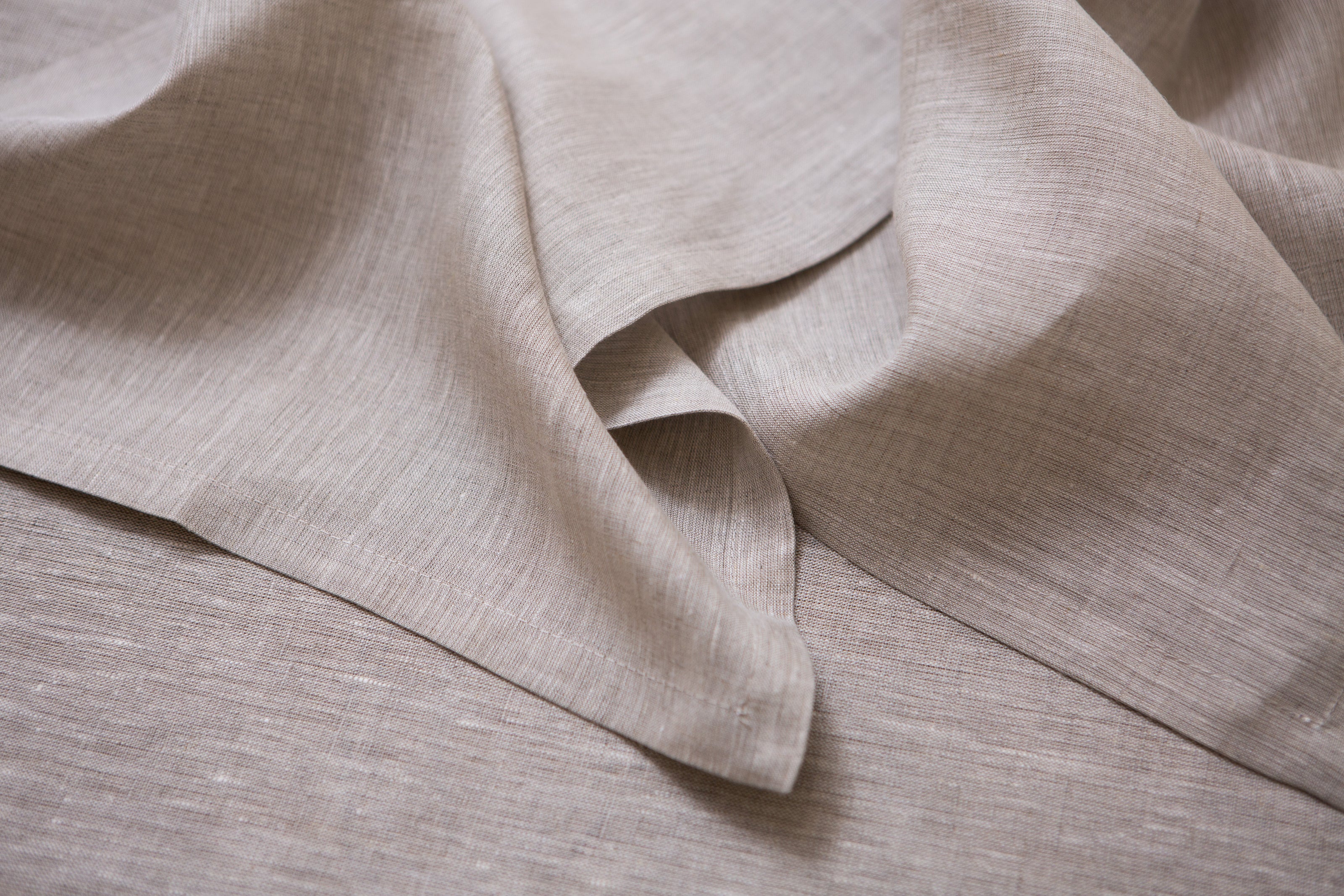 Beige organic linen napkins: OEKO-TEX certified, zero-waste, and perfect for creating a cozy, natural dining experience.