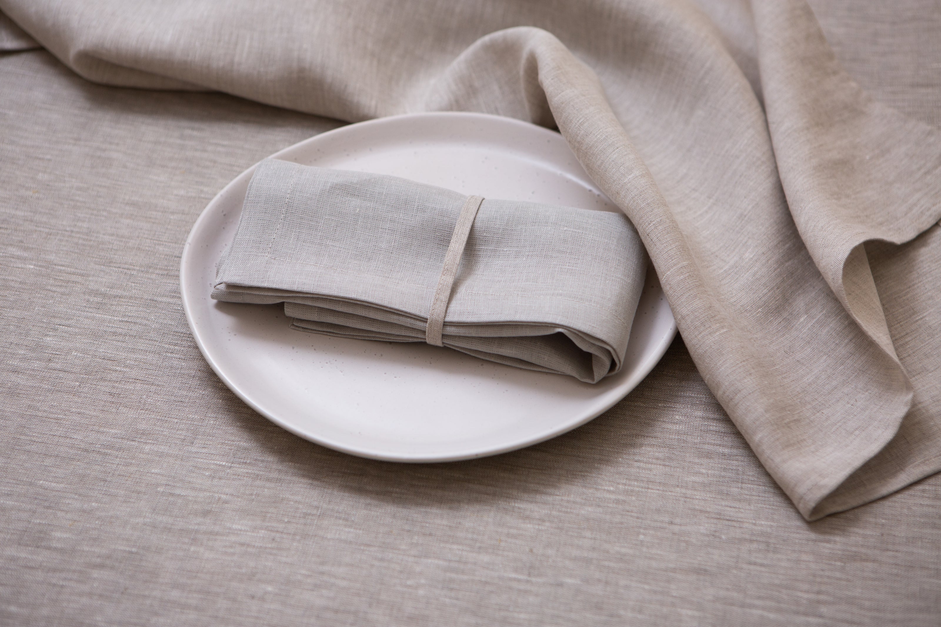 Timeless natural beige linen napkins made from 100% organic fabric. Stylish, durable, and sustainable table decor.