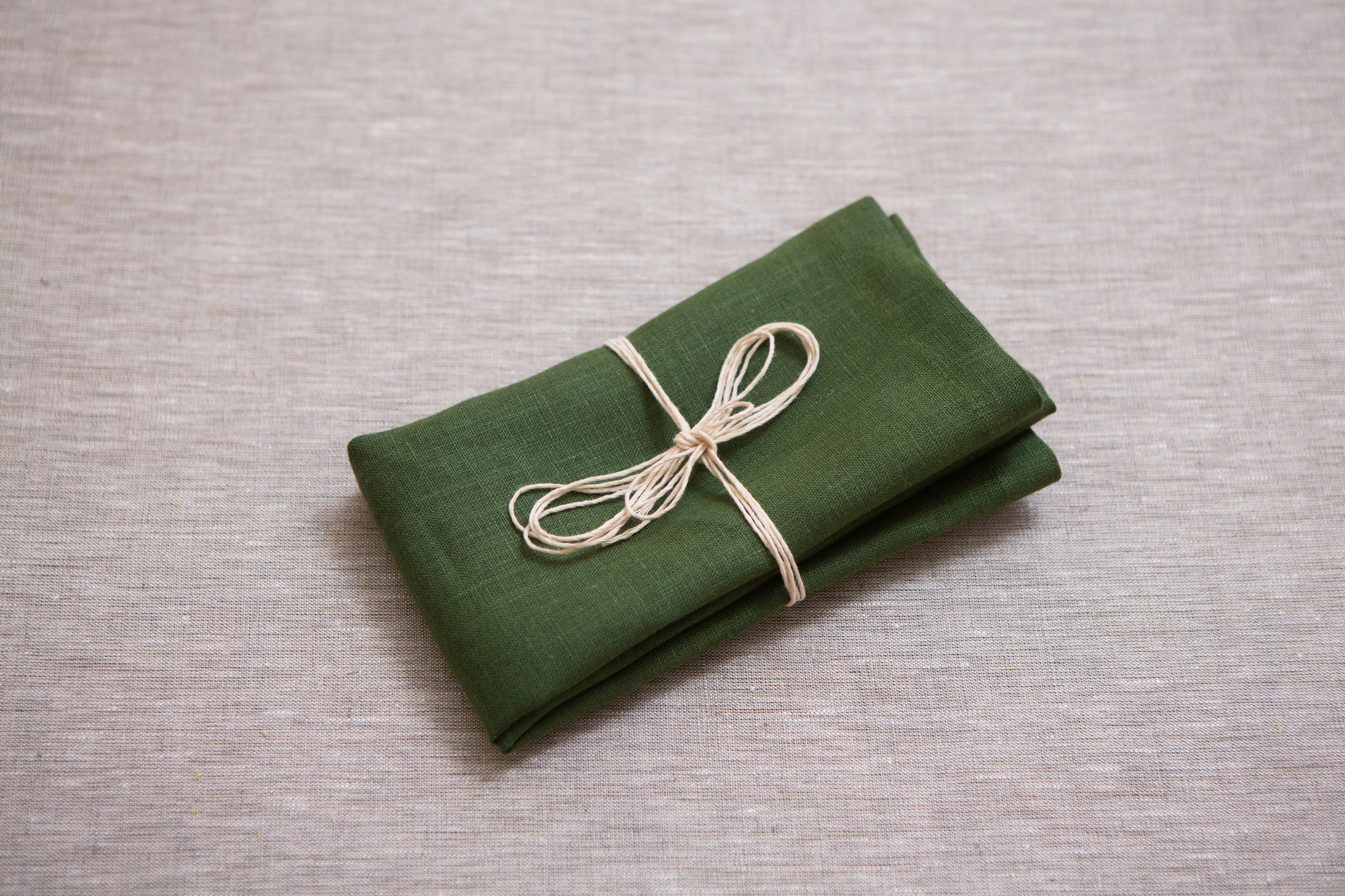 Add a touch of organic charm with green linen napkins. Designed for everyday elegance and holiday gatherings—Easter, New Year, Christmas, and more. A sustainable and stylish gift for any host.