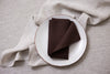 Sustainable cacao linen napkins – a warm, neutral touch for dinner parties, everyday meals, or as a thoughtful housewarming gift.