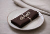 Cacao-colored organic linen napkins – add a touch of warmth and sophistication to your table. Sustainable, stylish, and perfect for any gathering.