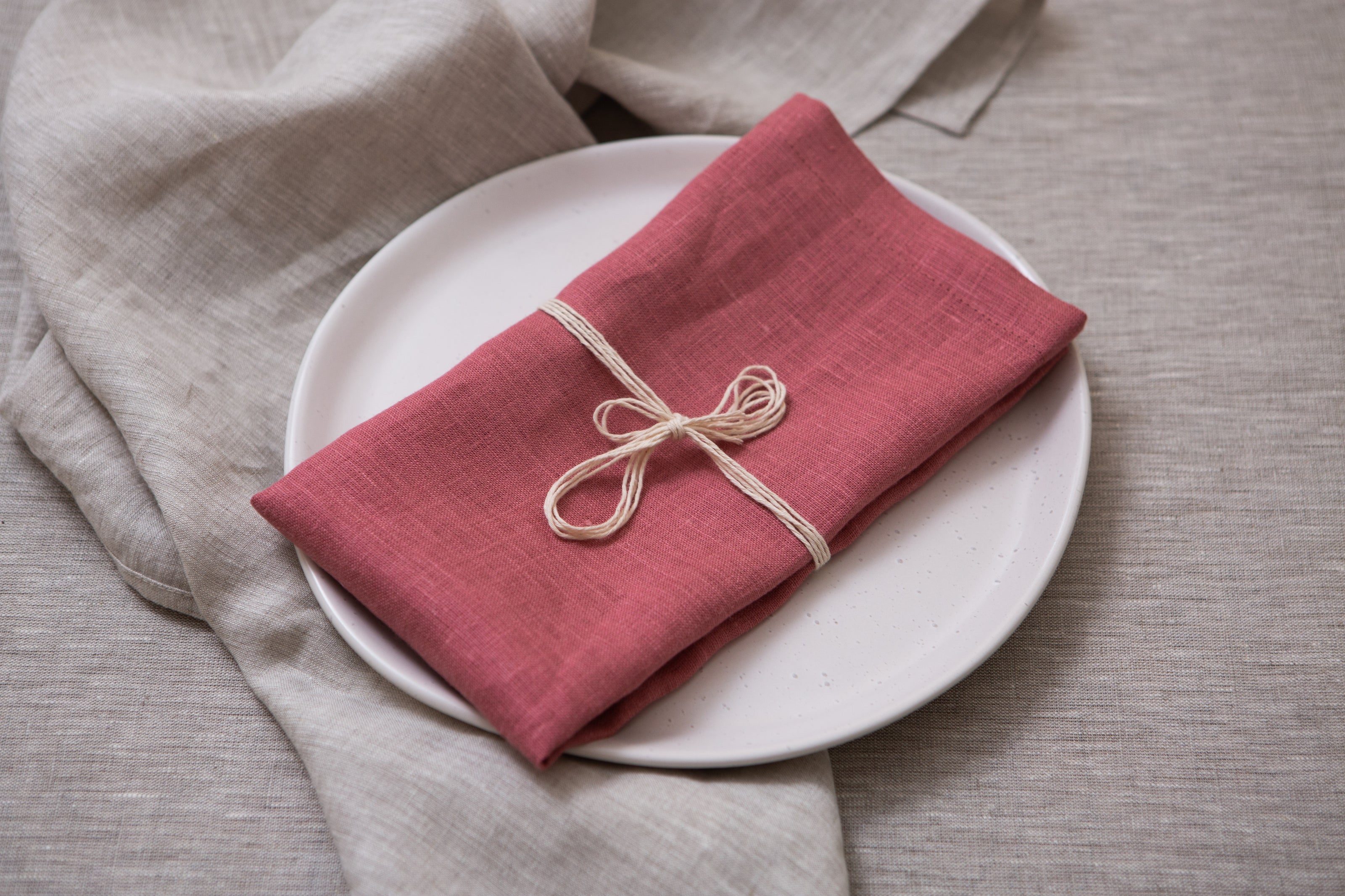 Salmon organic linen napkins with mitered corners. Elegant, sustainable, and perfect for any dining occasion. Mother's day gift.