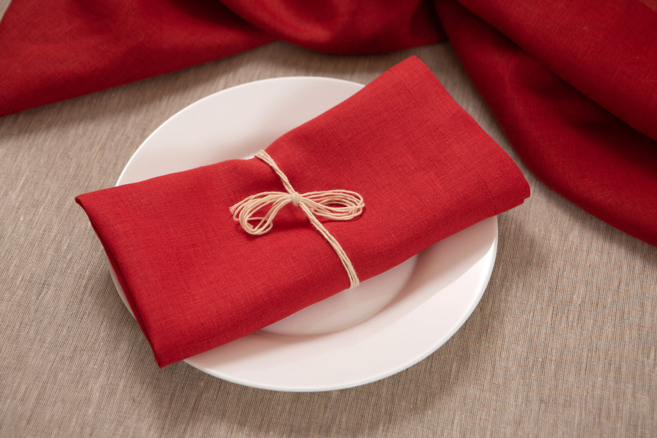 The vibrant red color #27 adds a touch of warmth and sophistication to any table setting, while the organic linen ensures a safe and eco-friendly choice. With exceptional softness and durability, these napkins are designed to withstand everyday use and maintain their exquisite texture over time.  CoolLinen store