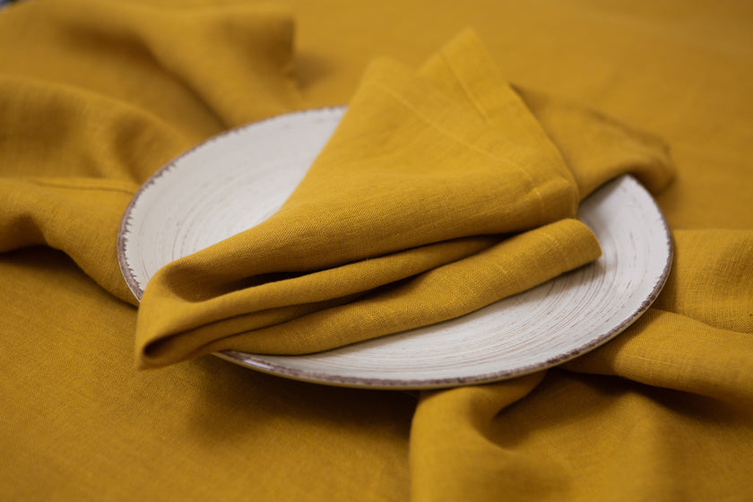 Mustard linen napkins made from 100% organic fabric – a vibrant, environmentally friendly choice for every special occasion or casual meal.