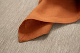 Timeless terracotta linen napkins made from 100% organic fabric. Stylish, durable, and eco-conscious table decor. Perfect linen gift.