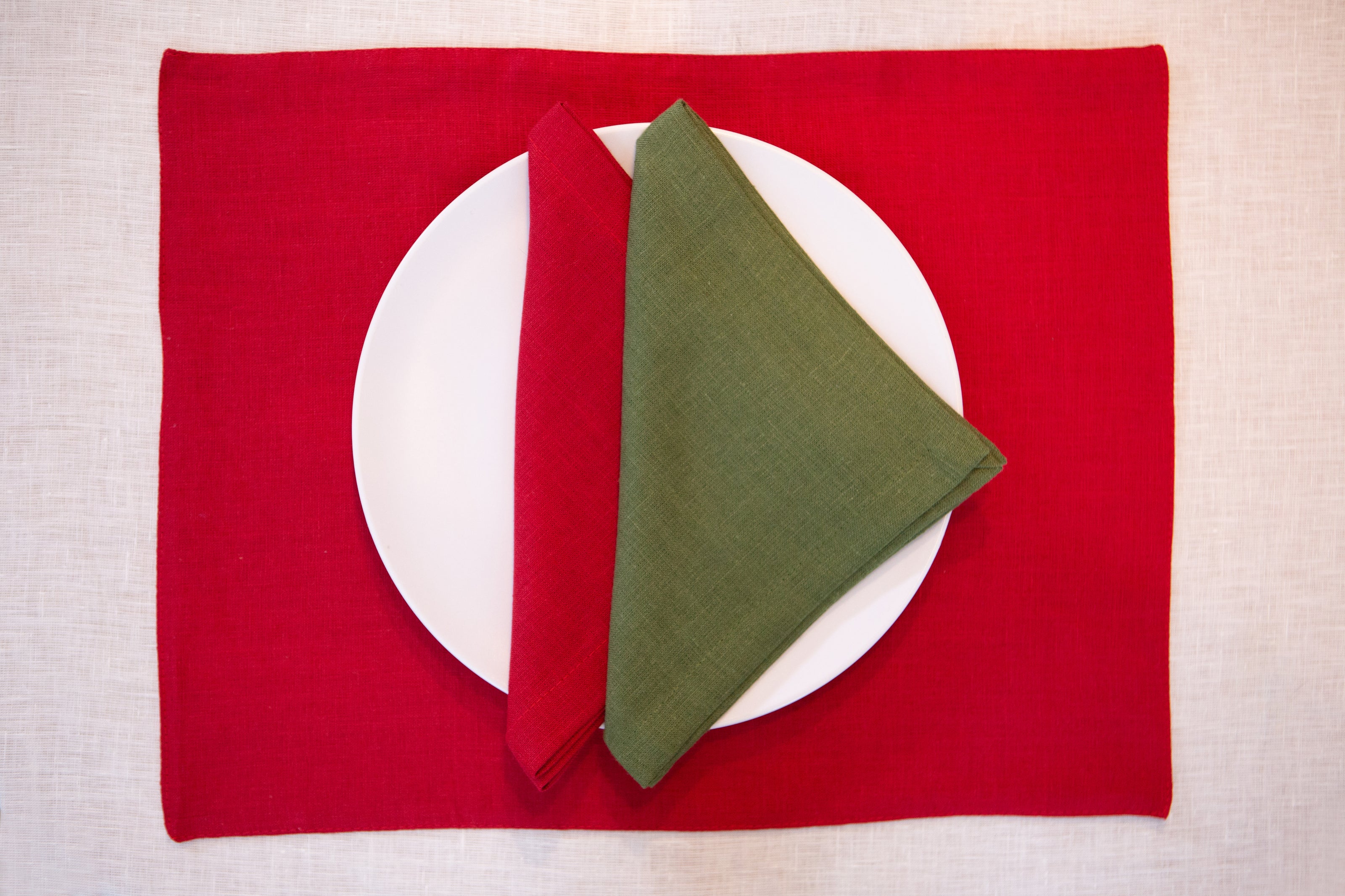 Eco-friendly red linen placemats, 100% natural & reusable. Elevate your Christmas and New Year dining with sustainable style. Perfect Christmas gift.