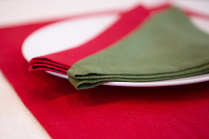 Green linen placemats. For Christmas & New Year Celebration