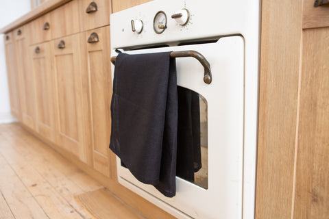 Elegant black linen towel – a perfect gift for Christmas, housewarming, or Halloween, combining functionality with refined design.