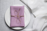 Lavender organic linen napkin styled for Easter celebration with a soft pastel aesthetic. The delicate purple shade enhances spring table decor and festive gatherings. Made from sustainable linen for elegant and eco-friendly hosting.