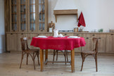 Classic red organic linen tablecloth, perfect for elegant dining, made from 100% eco-friendly linen, showcasing a timeless design for any occasion.