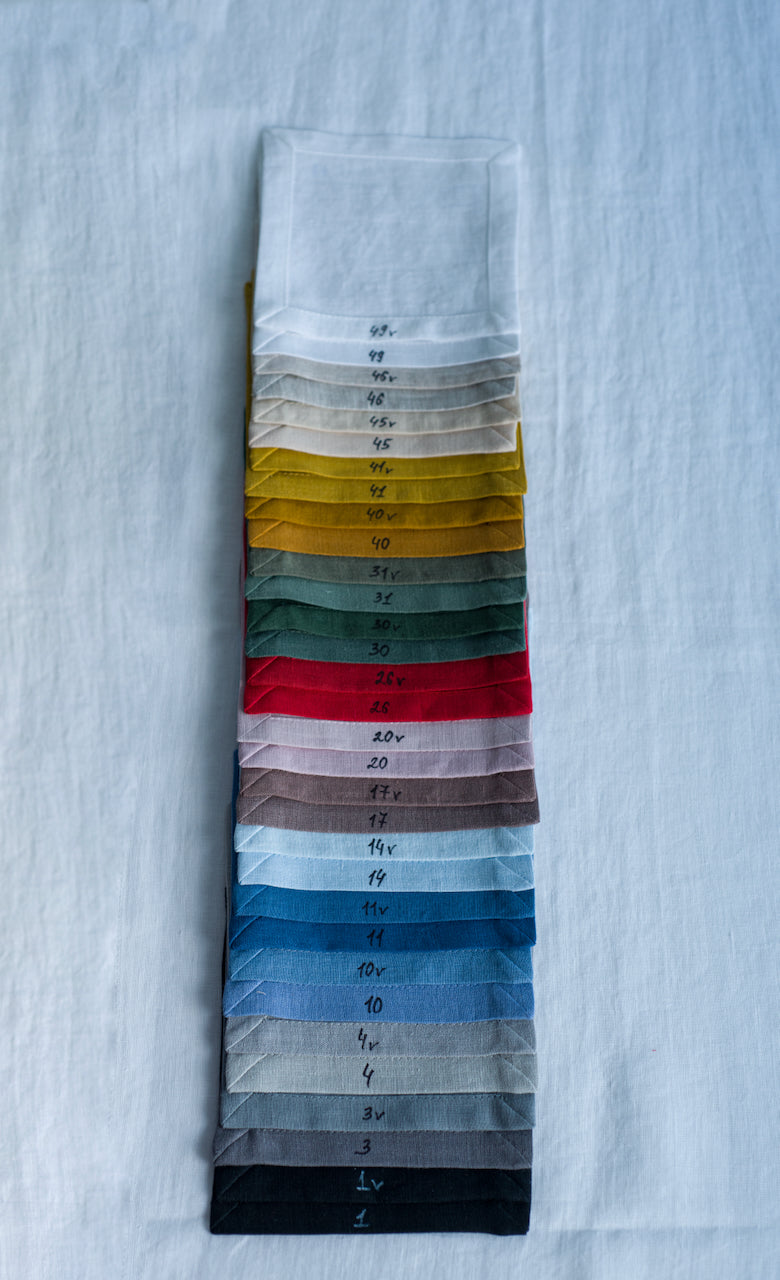 Linen fabric swatches set in various colors, organic flax samples for selecting perfect shade for table setting and home decor
