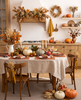 Thanksgiving dinner table with a natural beige rectangular linen tablecloth, terracotta linen placemats and napkins, pumpkins and candles in a rustic kitchen – CoolLinen