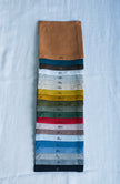 Organic linen fabric swatches in multiple colors, natural flax samples for choosing table linens, napkins and placemats