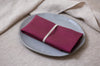 The alluring Plum color of organic linen napkins exudes a sense of elegance and depth. Inspired by the rich hues of ripe plums, this regal shade represents prosperity and refinement. Its deep, velvety tones bring a touch of drama and sophistication to your table, making it ideal for both intimate gatherings and grand celebrations.