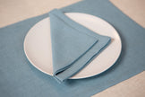 Teal is often associated with serenity, balance, and a connection to nature, making it a perfect choice for creating a serene dining experience. Whether you're hosting an intimate dinner or a festive gathering, the teal organic linen napkins effortlessly enhance the ambiance, adding a touch of elegance to any occasion.