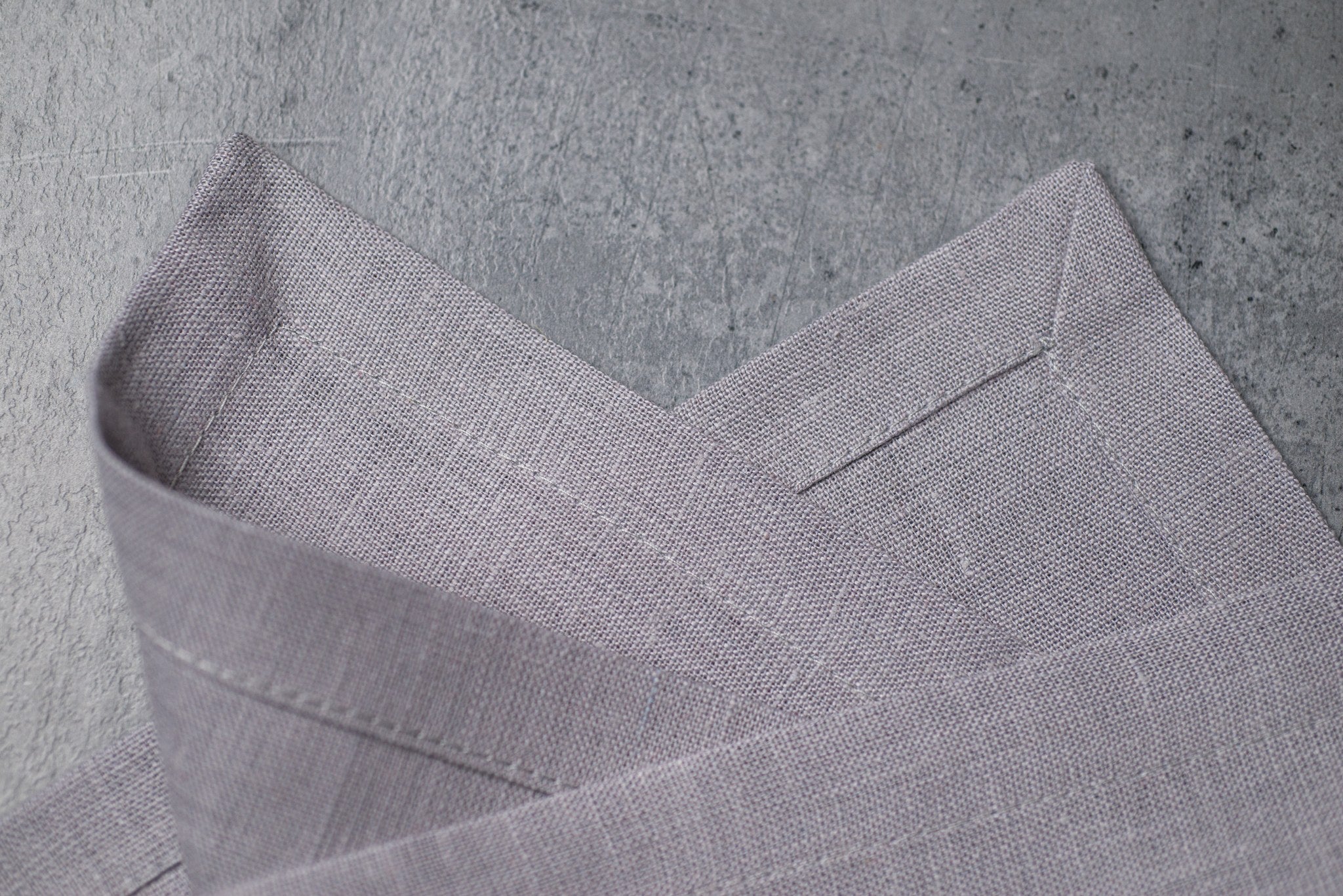 Light Grey linen fabric close-up with mitered hem corner – CoolLinen color 4. Light Grey