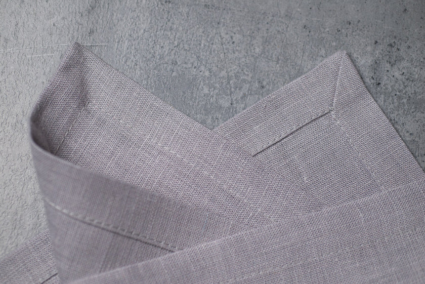 Light Grey linen fabric close-up with mitered hem corner – CoolLinen color 4. Light Grey