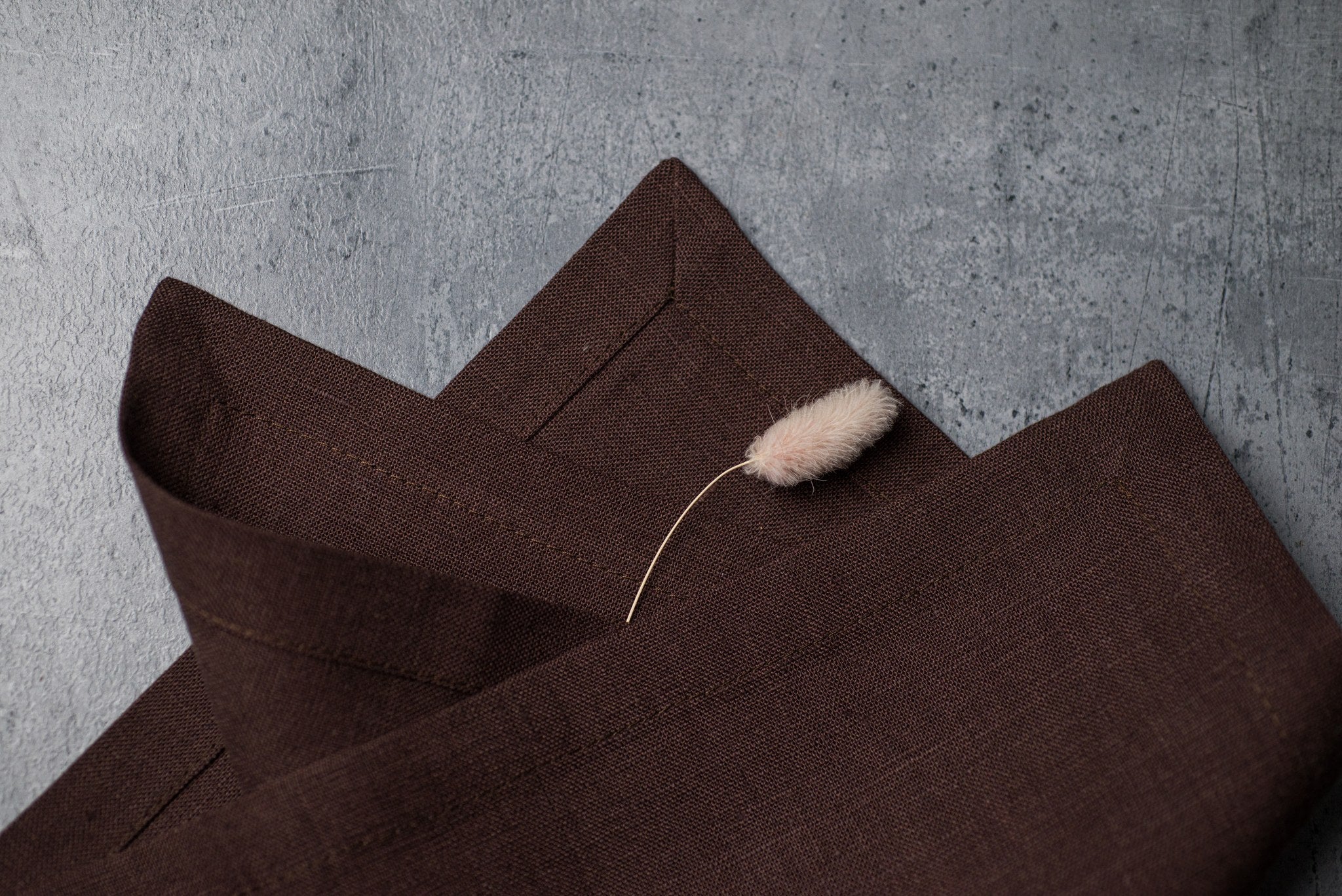 Cacao linen fabric close-up with mitered hem corner – CoolLinen color 5. Cacao