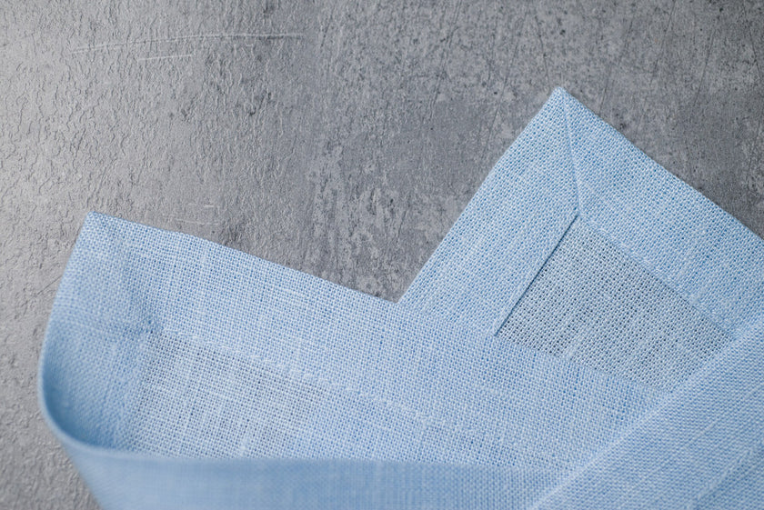 Snow linen fabric close-up with mitered hem corner – CoolLinen color Snow