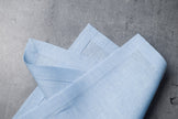 Snow linen fabric close-up with mitered hem corner – CoolLinen color Snow