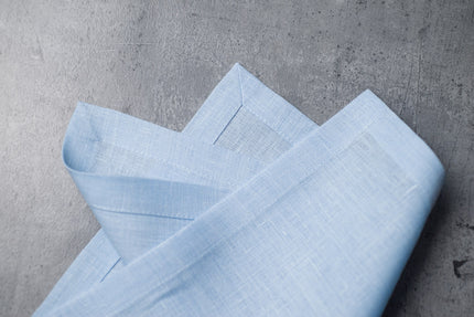 Snow linen fabric close-up with mitered hem corner – CoolLinen color Snow