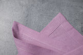 Lavender linen fabric close-up with mitered hem corner – CoolLinen color 19. Lavender