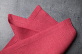 Salmon linen fabric close-up with mitered hem corner – CoolLinen color 24. Salmon