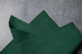 Hunter linen fabric close-up with mitered hem corner – CoolLinen color 33. Hunter