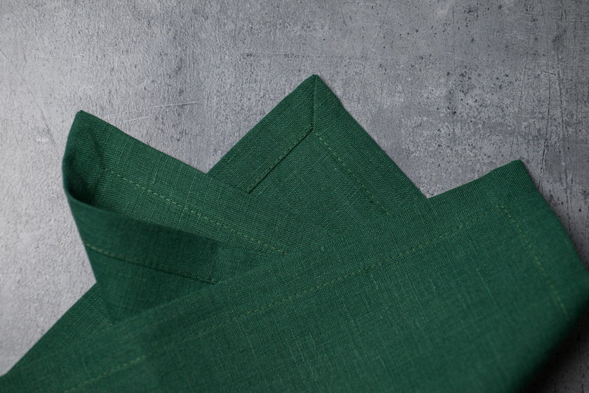 Hunter linen fabric close-up with mitered hem corner – CoolLinen color 33. Hunter