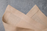Sand linen fabric close-up with mitered hem corner – CoolLinen color 45. Sand